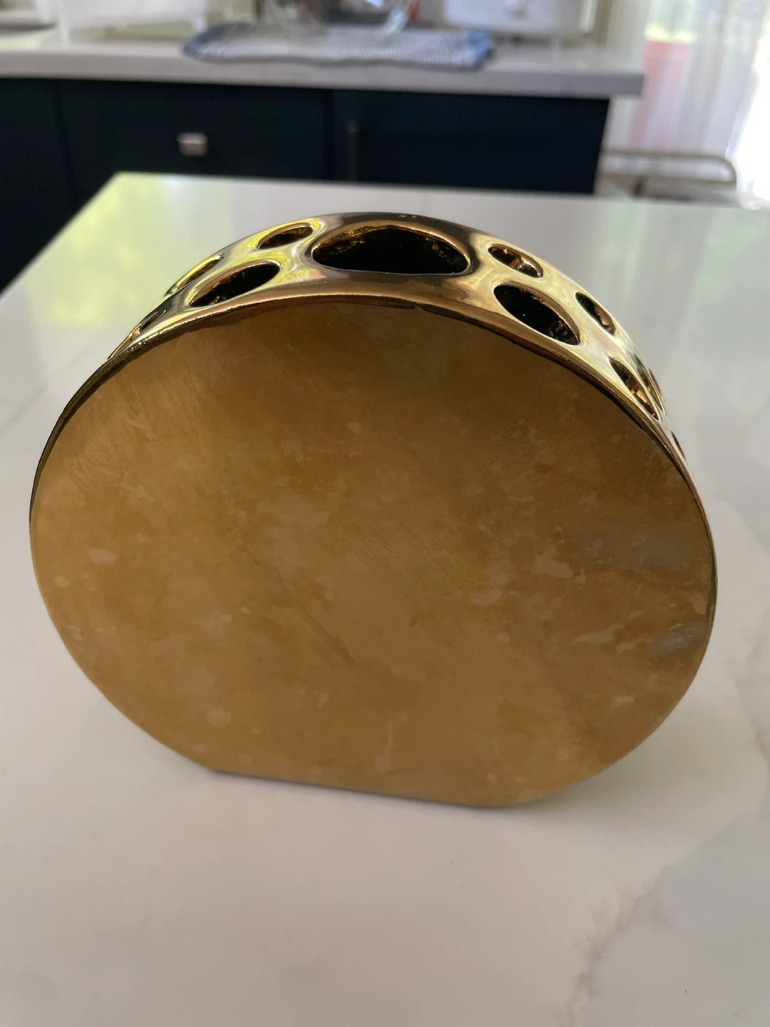 Gold coloured vase, rounded