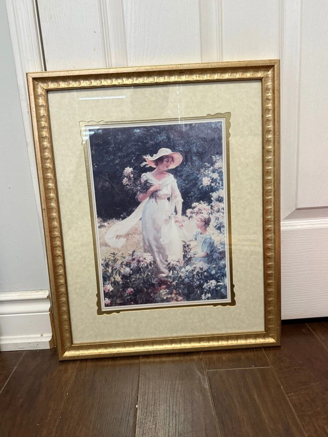 Framed Print of Woman in Garden