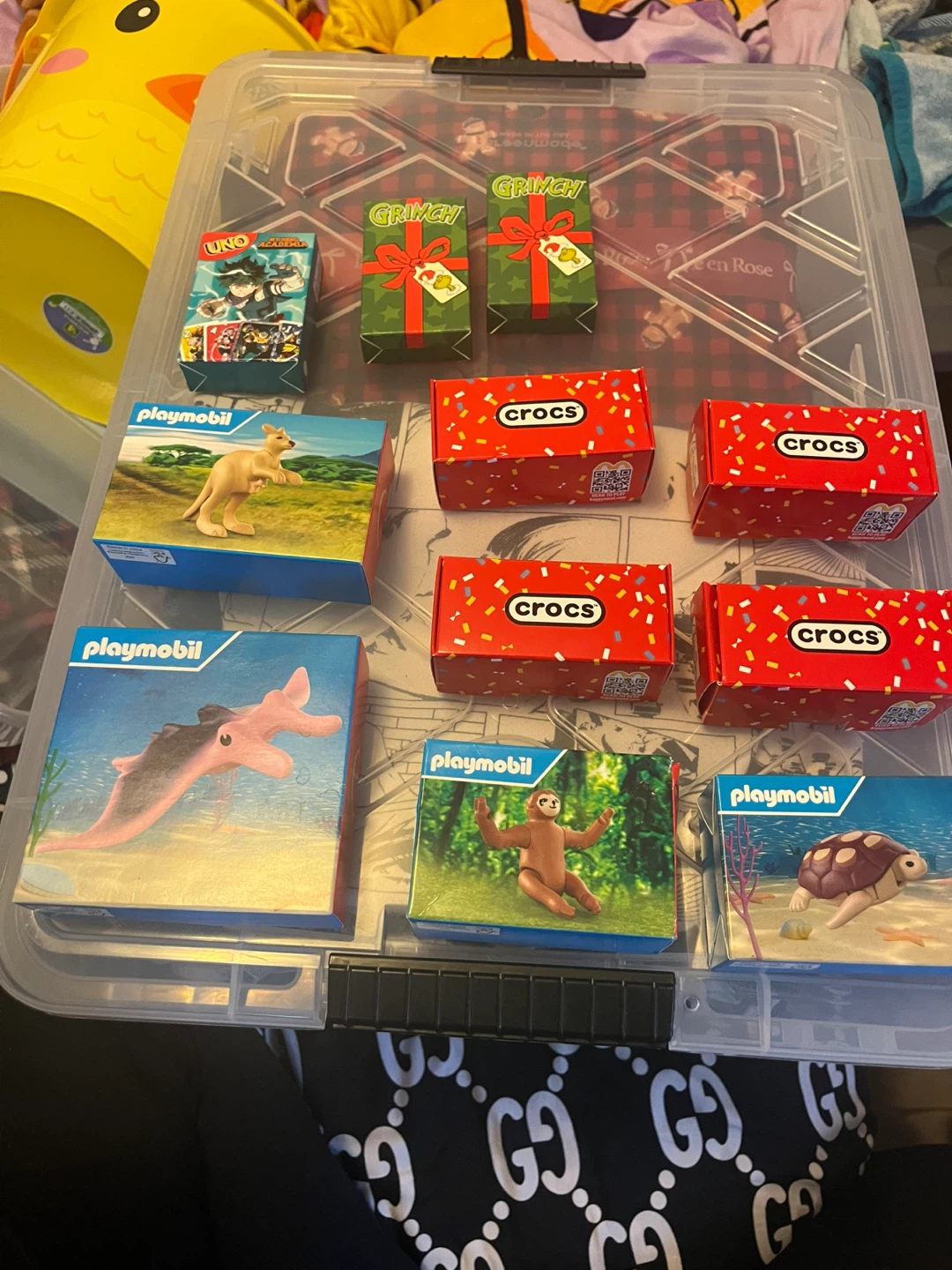 Assorted Playmobil, UNO, and Grinch items