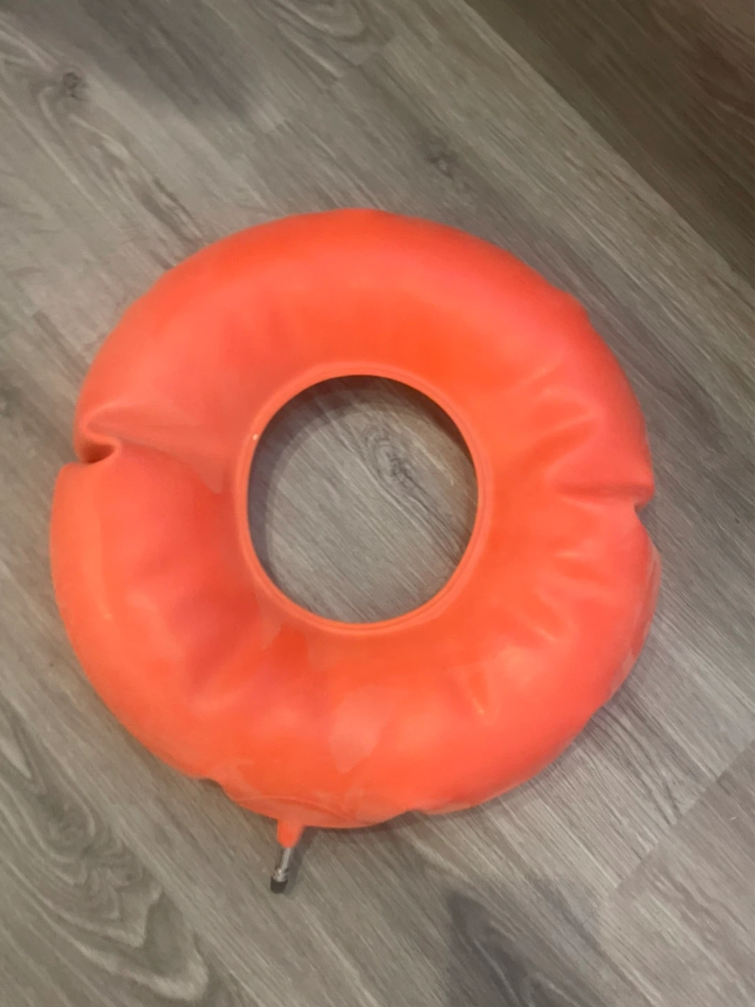 Inflatable doughnut for sitting on