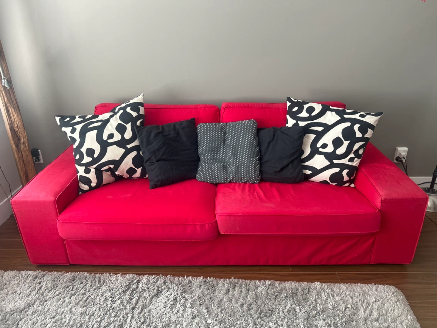 Red Sofa with Decorative Pillows - photo 2