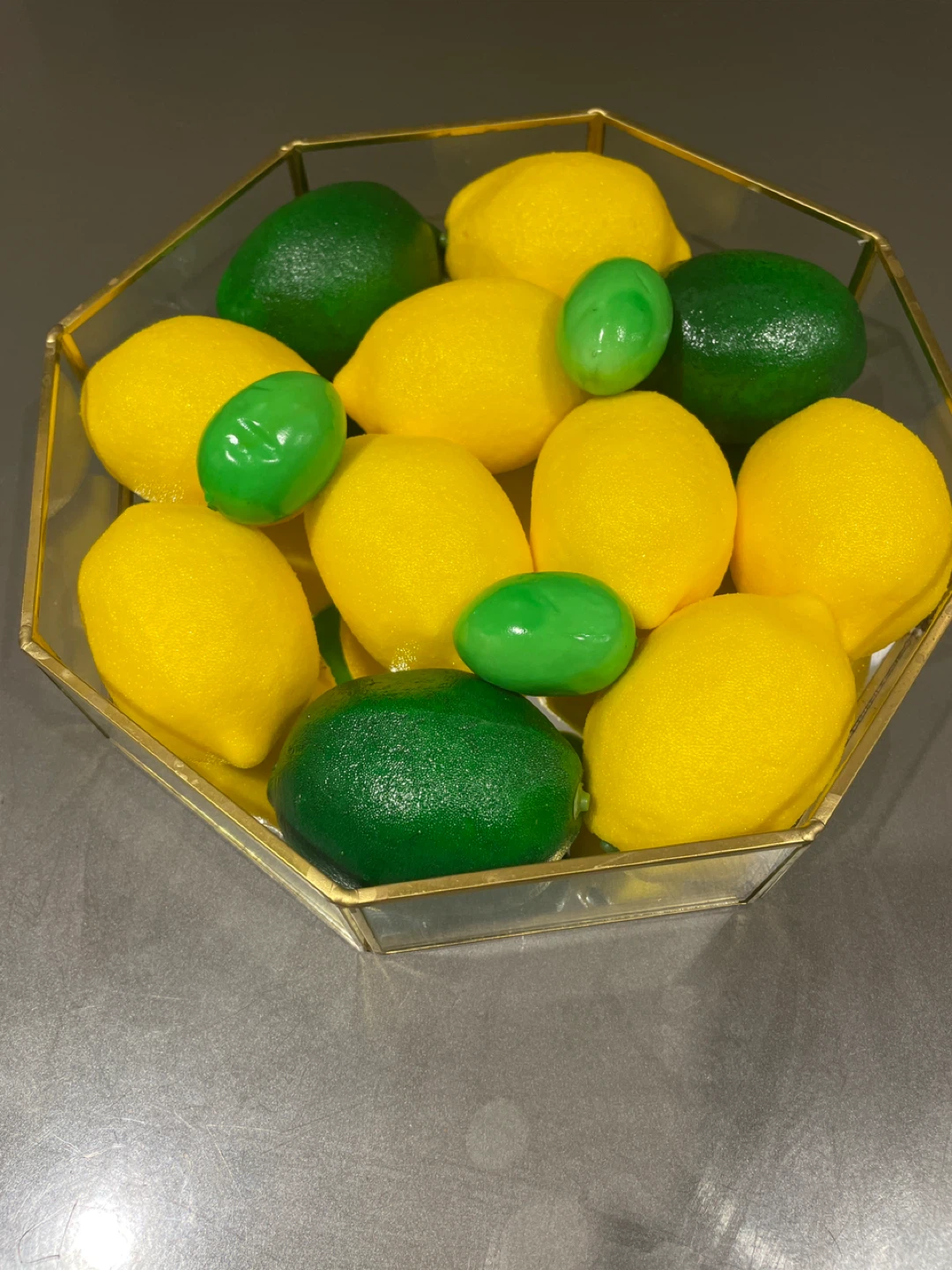 Decorative Lemons and Limes in Hexagonal Glass Holder