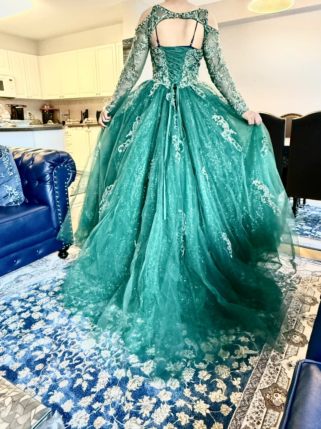 Emerald Green Ball Gown with Intricate Embellishments