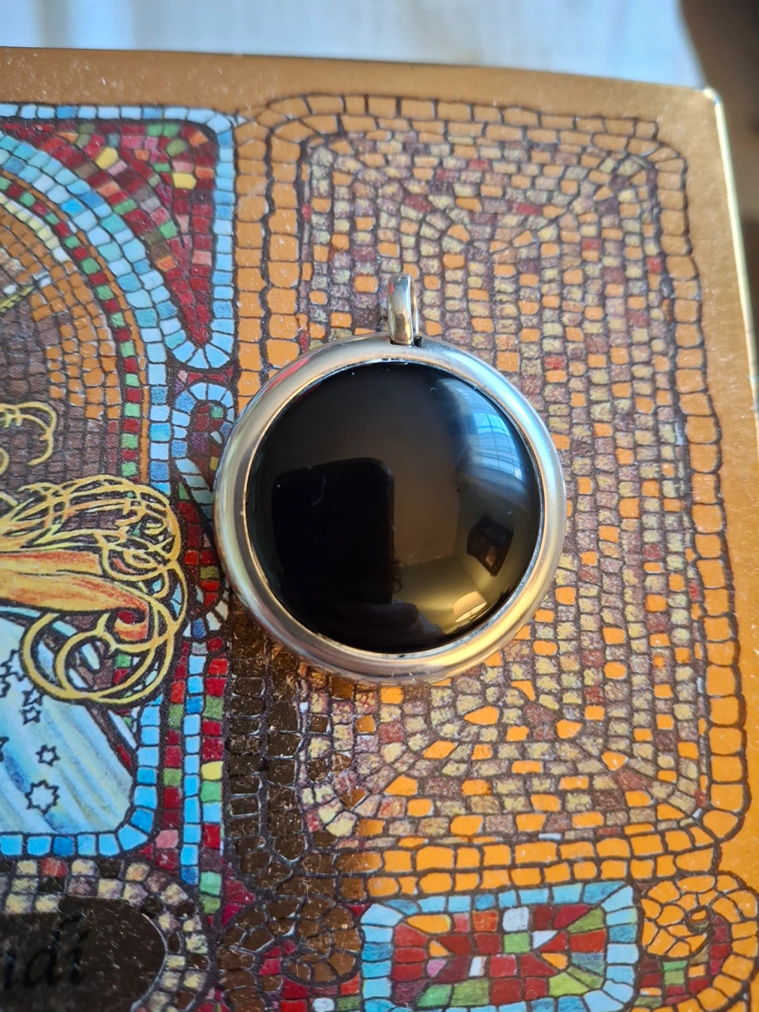 Round black pendant (stamped 925A)