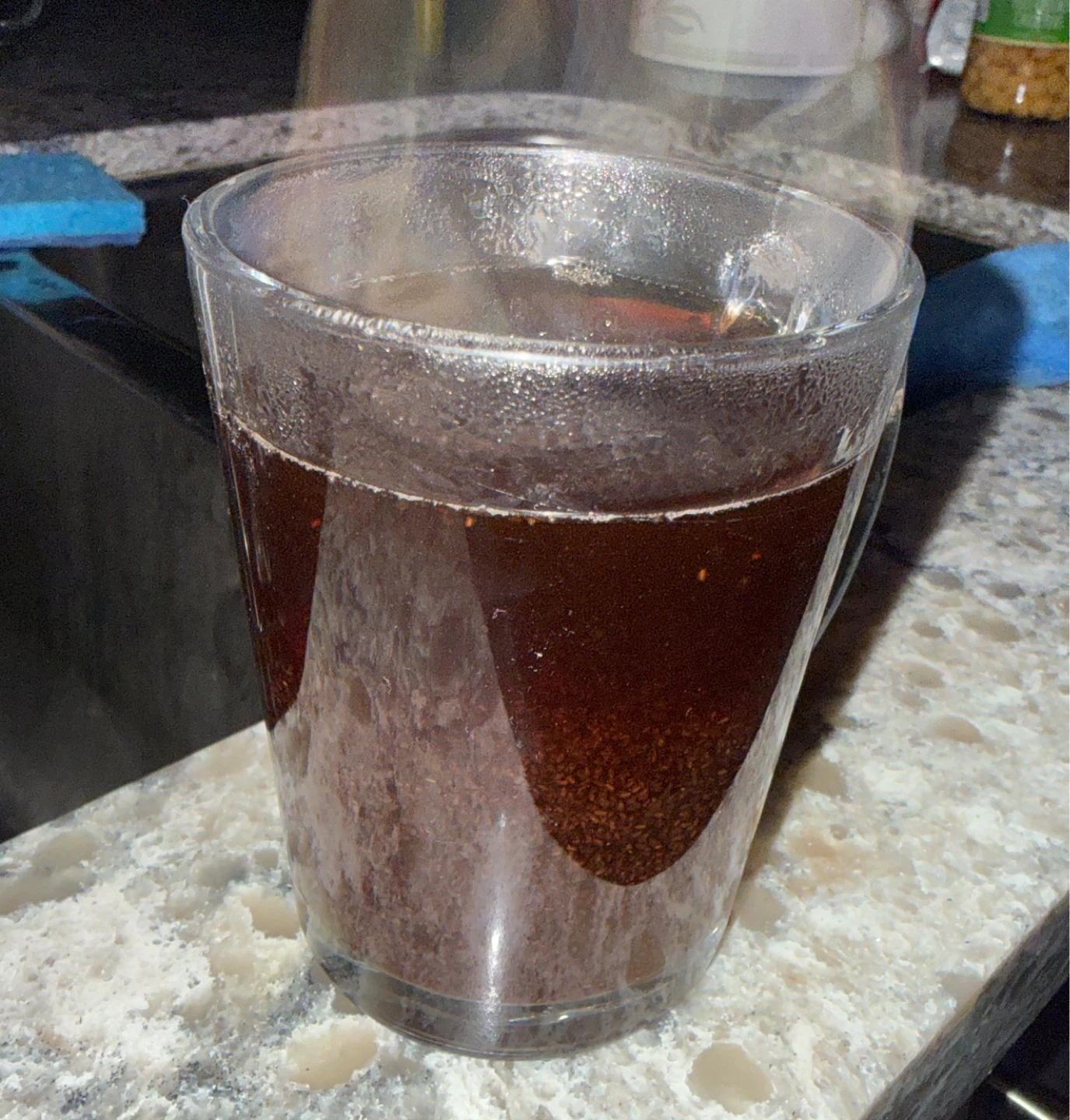 Glass mug with tea