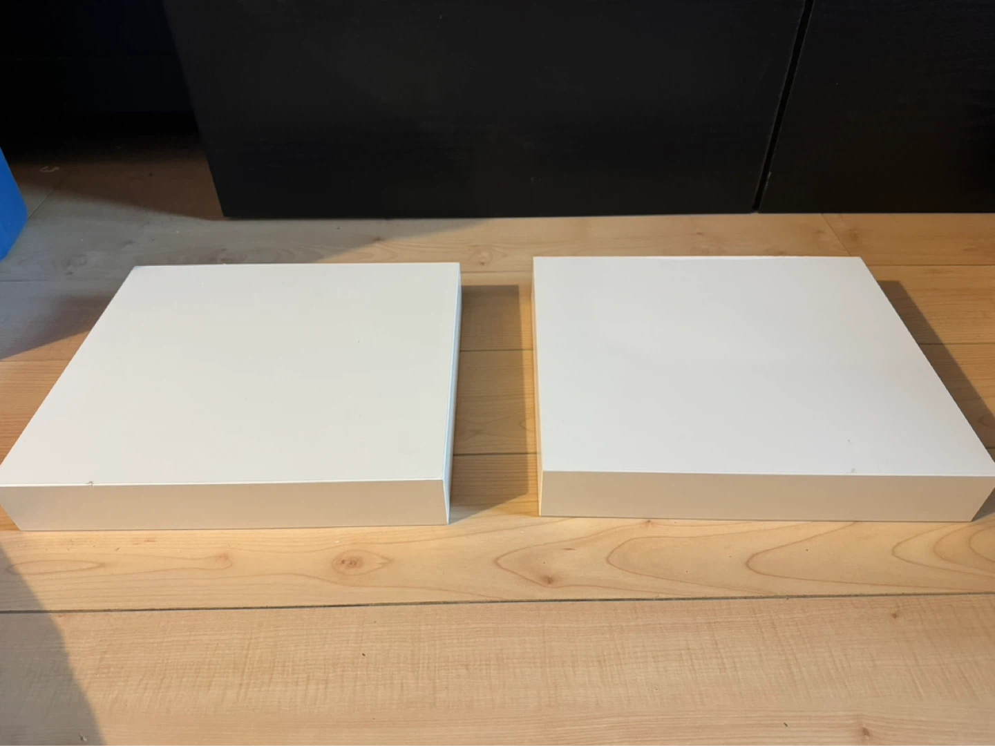 Two White Floating Shelves