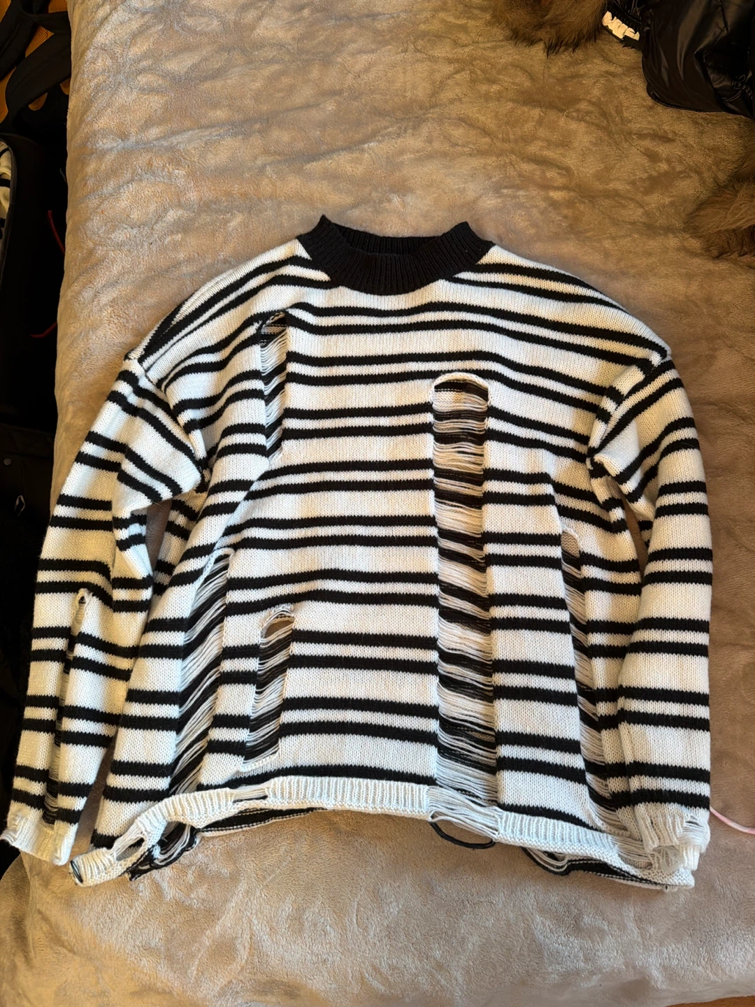Black and White Striped Sweater with Distressed Details