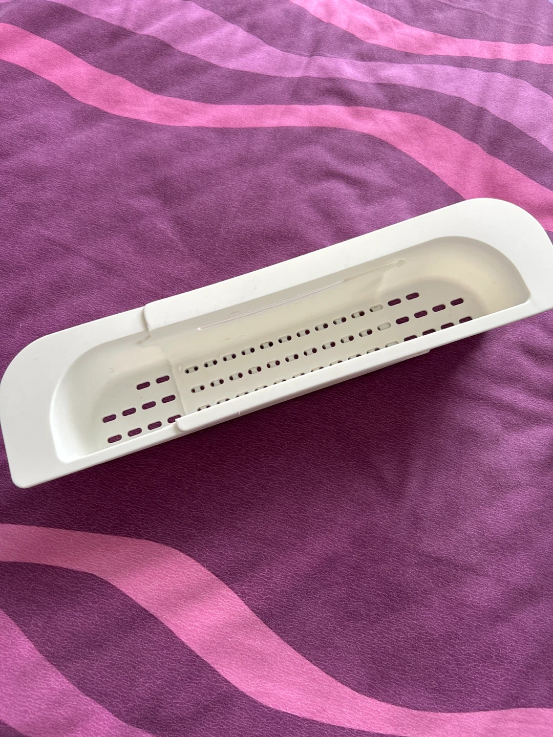 FREE! Extendable over sink caddy.