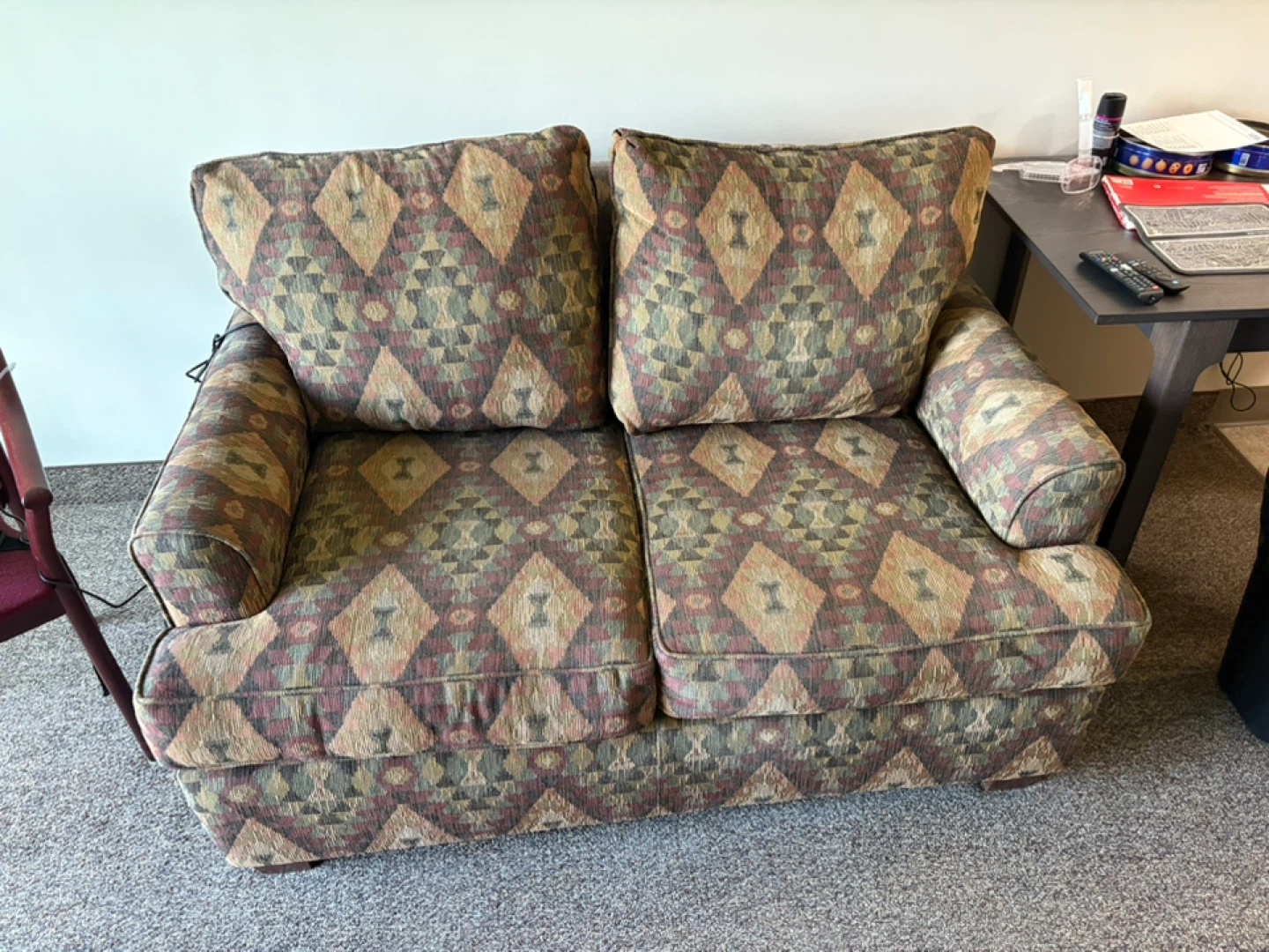 Loveseat with patterned upholstery