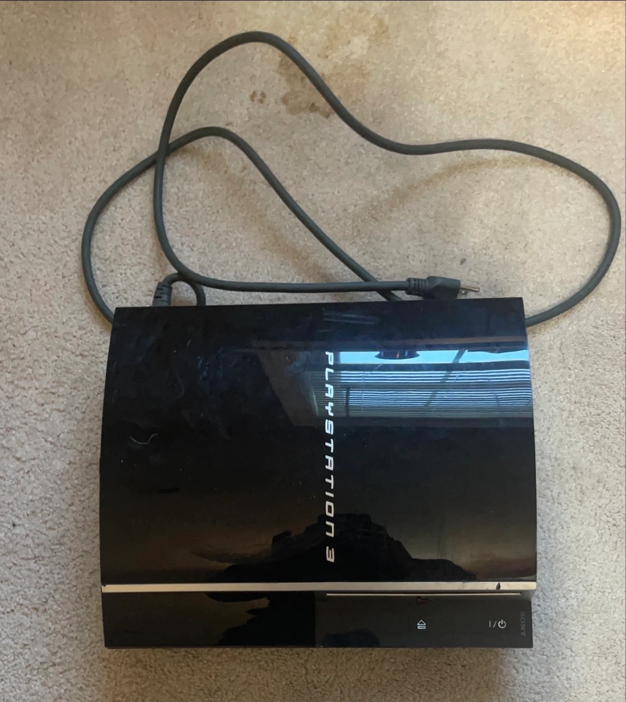 Black Sony PlayStation 3 Console with Controller