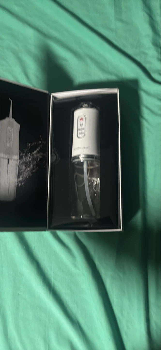 Sharper Image Portable Cordless Oral Irrigator - photo 2