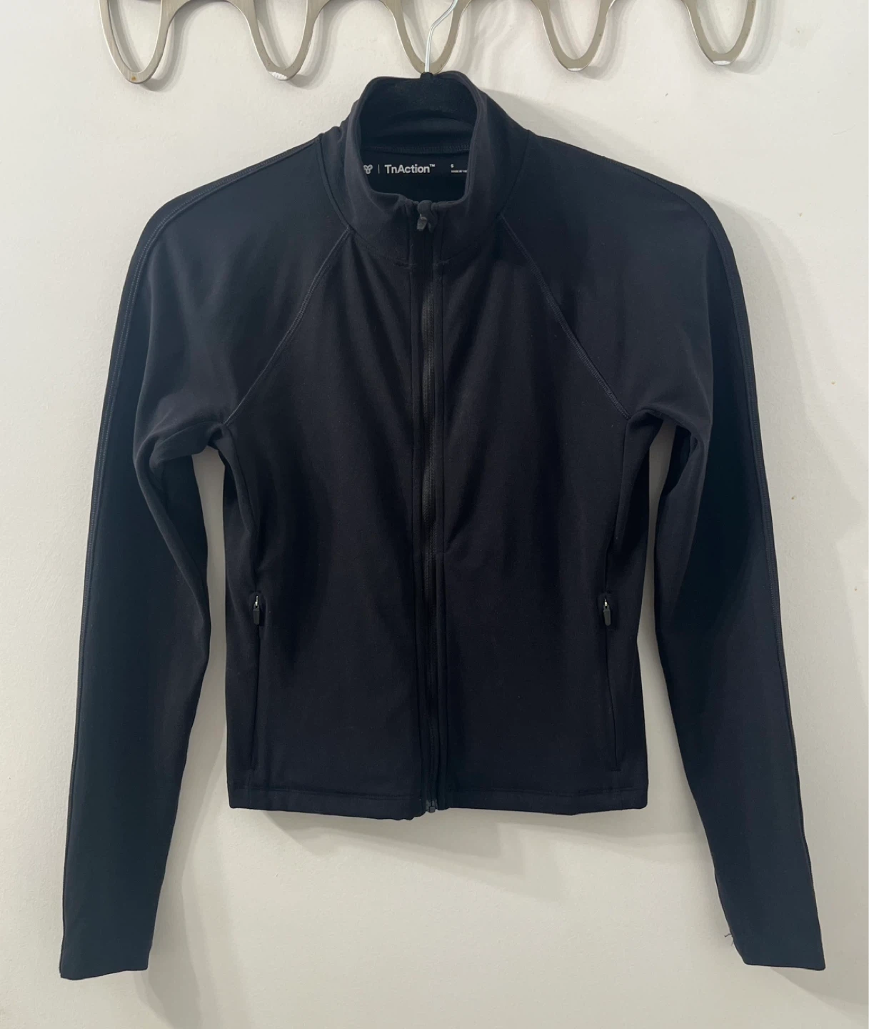 TNA zip up