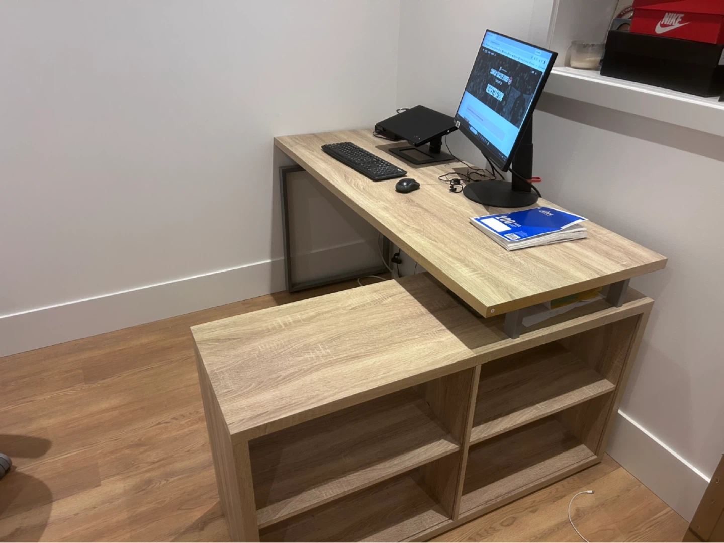 Oak finish L-shaped desk with storage