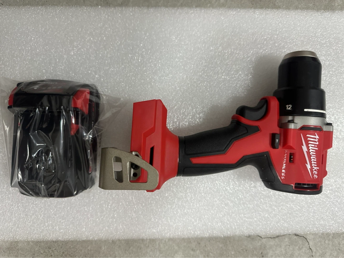 Milwaukee M18 REDLITHIUM CP2.0 Battery and Drill