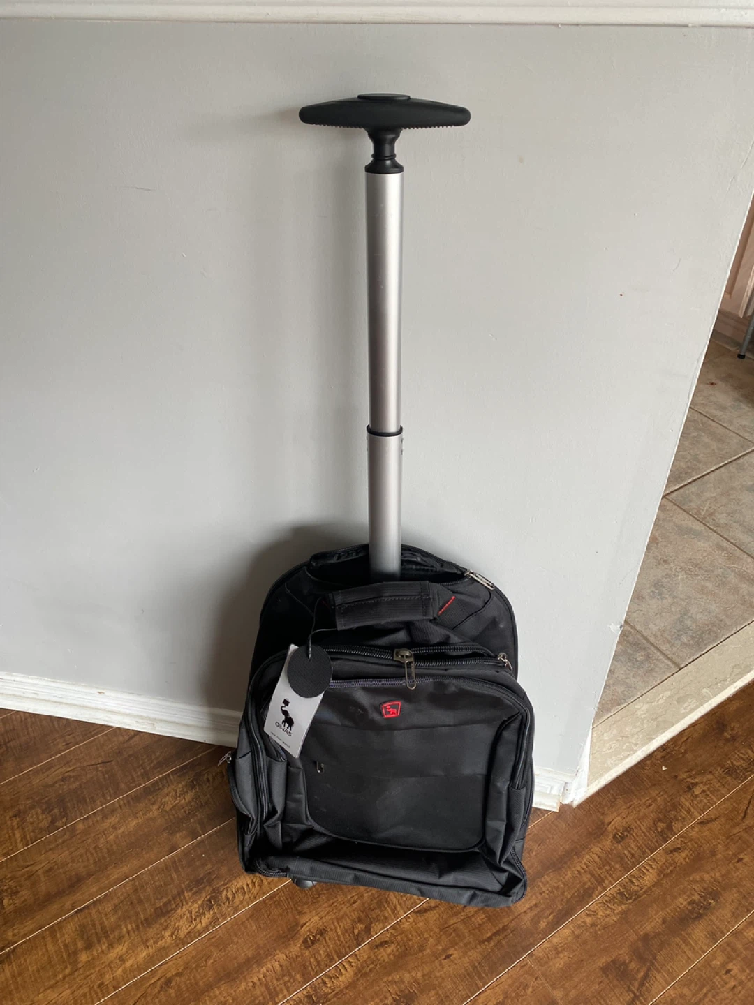 Delsey Black Rolling Backpack
