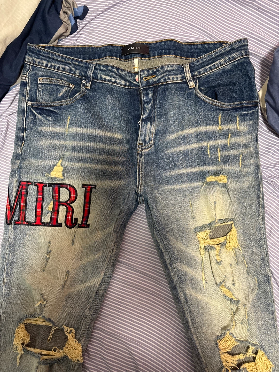 AMIRI Distressed Jeans