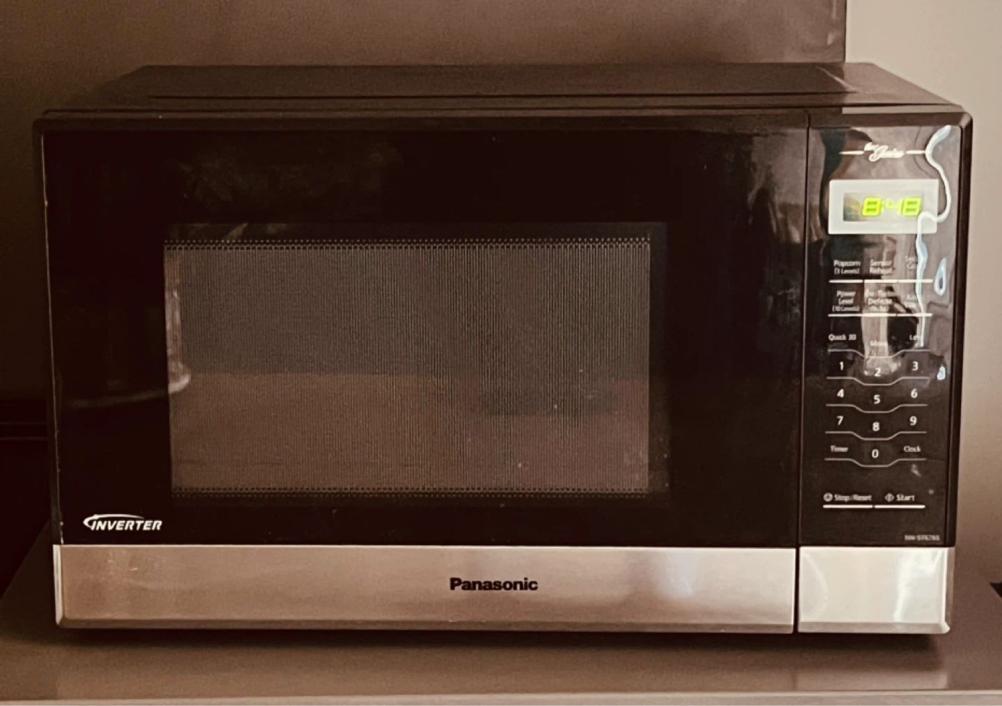 MOVING SALE | Panasonic Microwave - photo 2