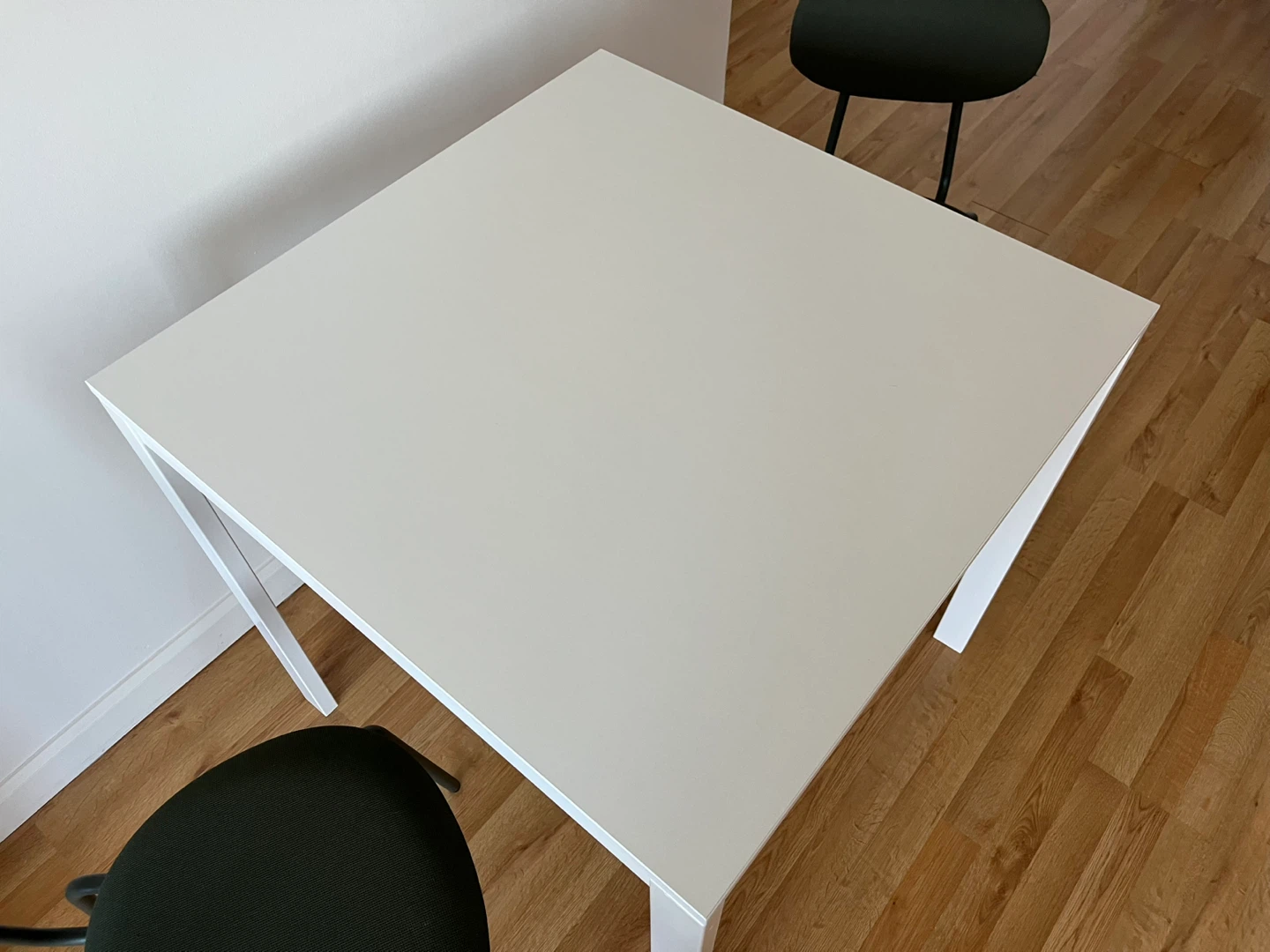 White dinning table with dark green chairs - photo 4