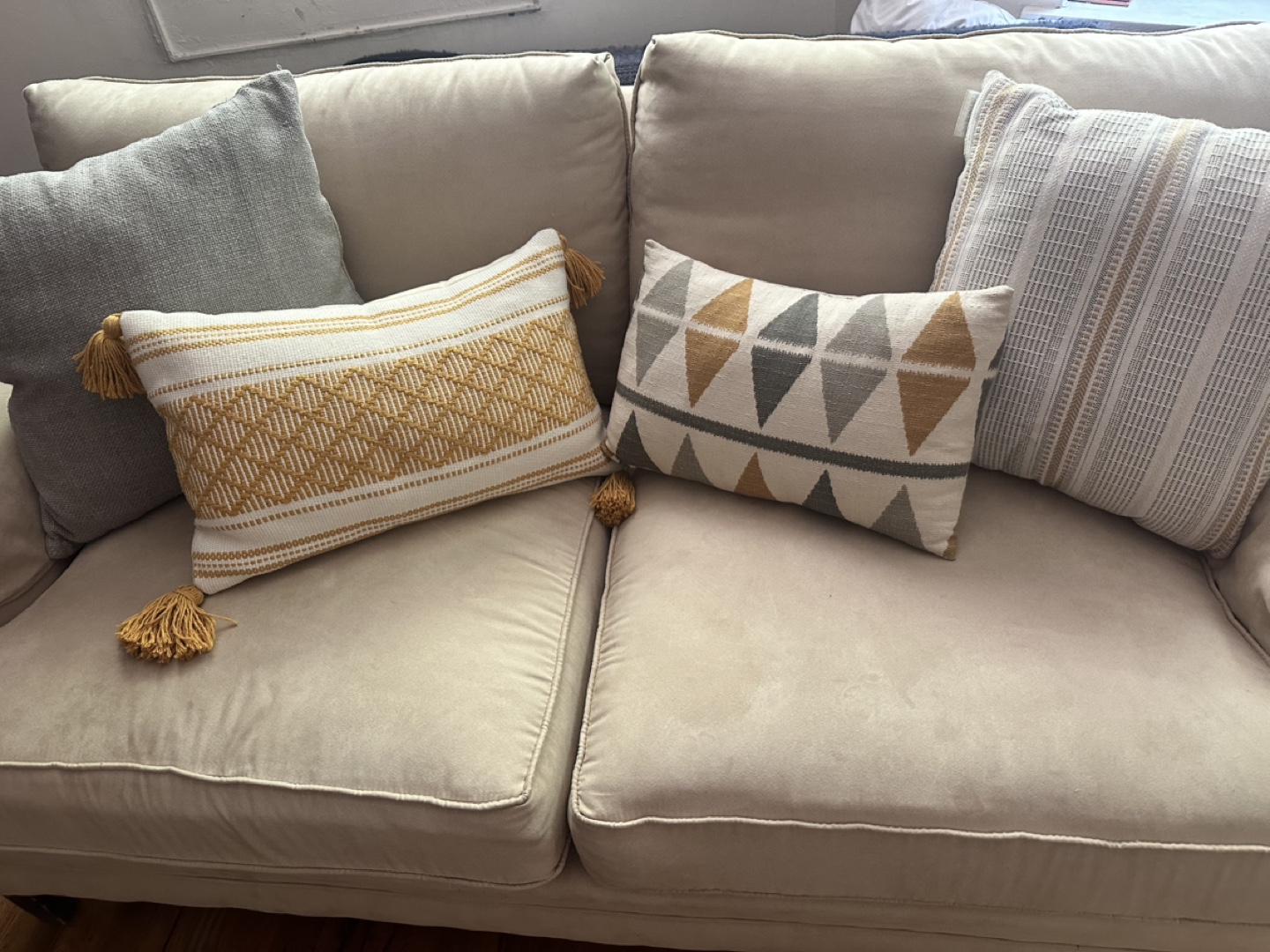 Grey and amber accent pillows