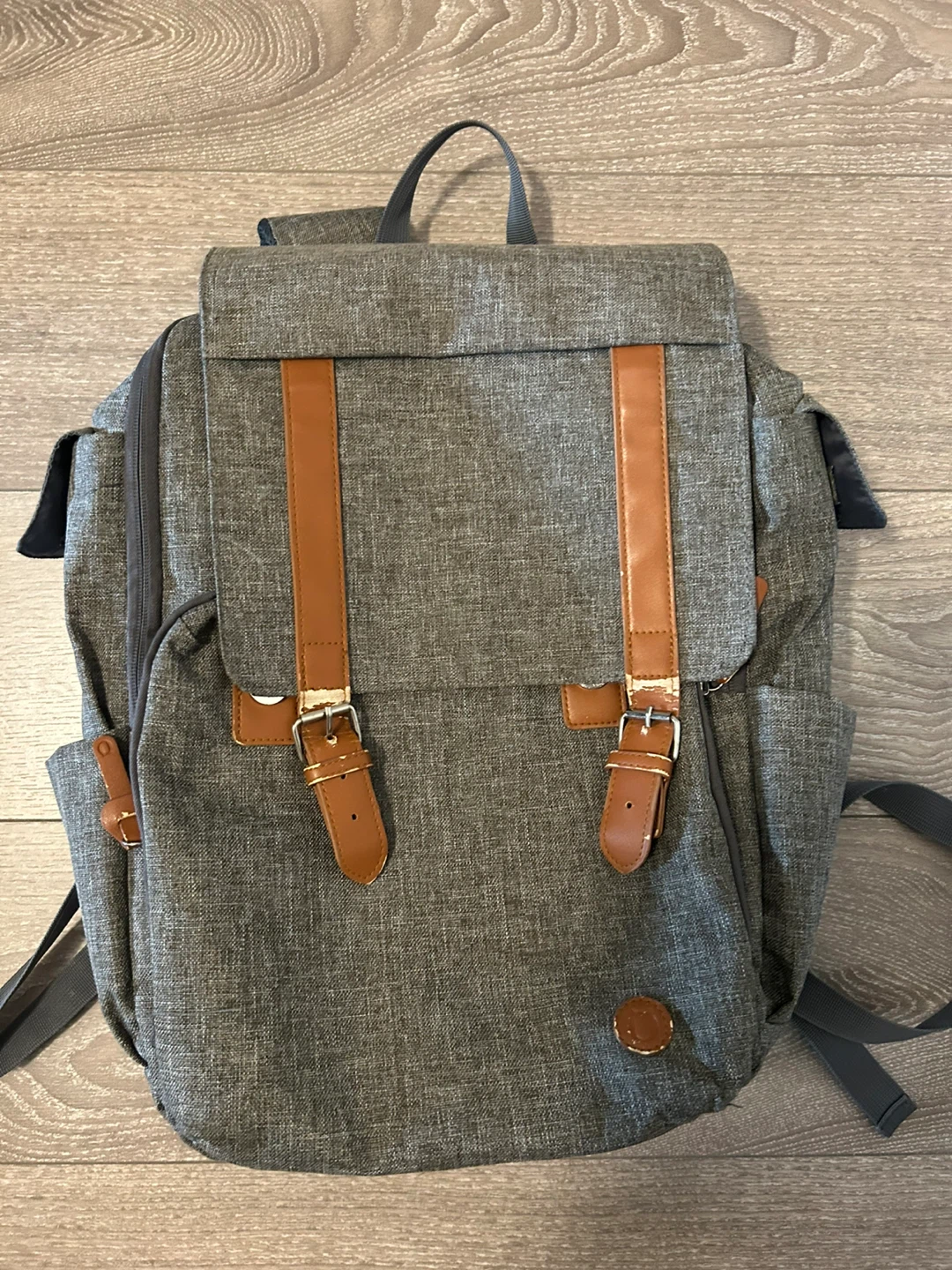 Grey Backpack with Brown Straps