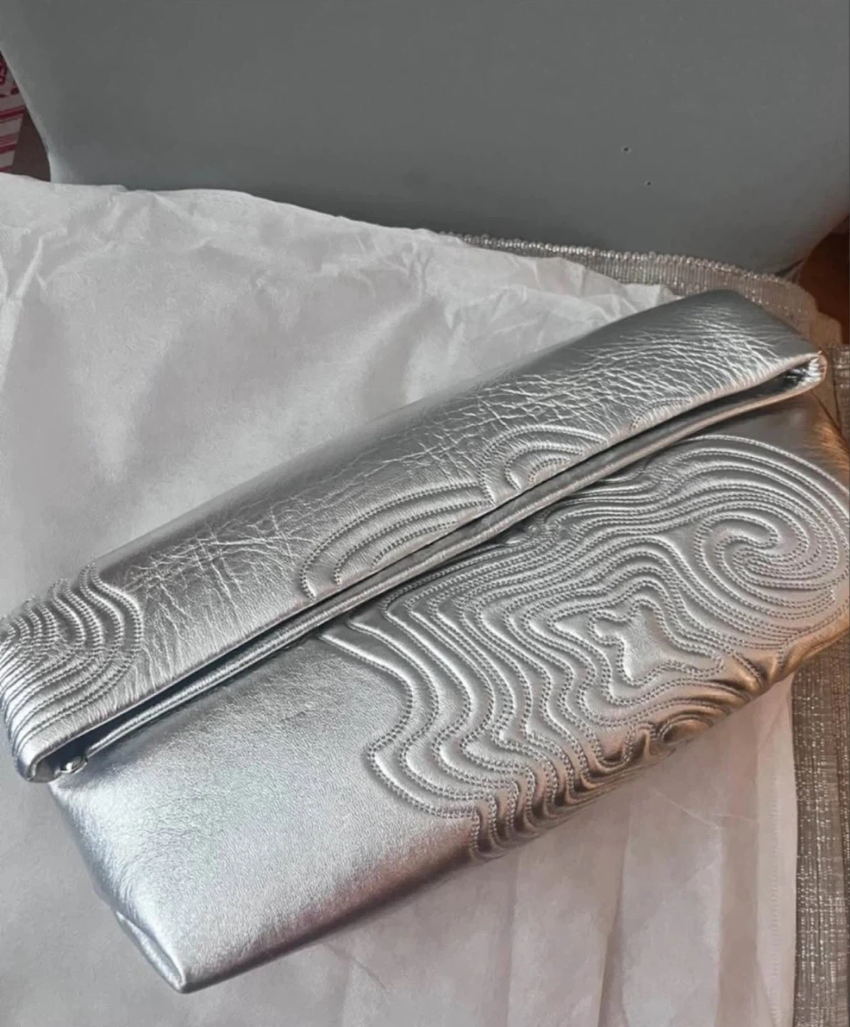 Silver Clutch Bag with Embossed Pattern