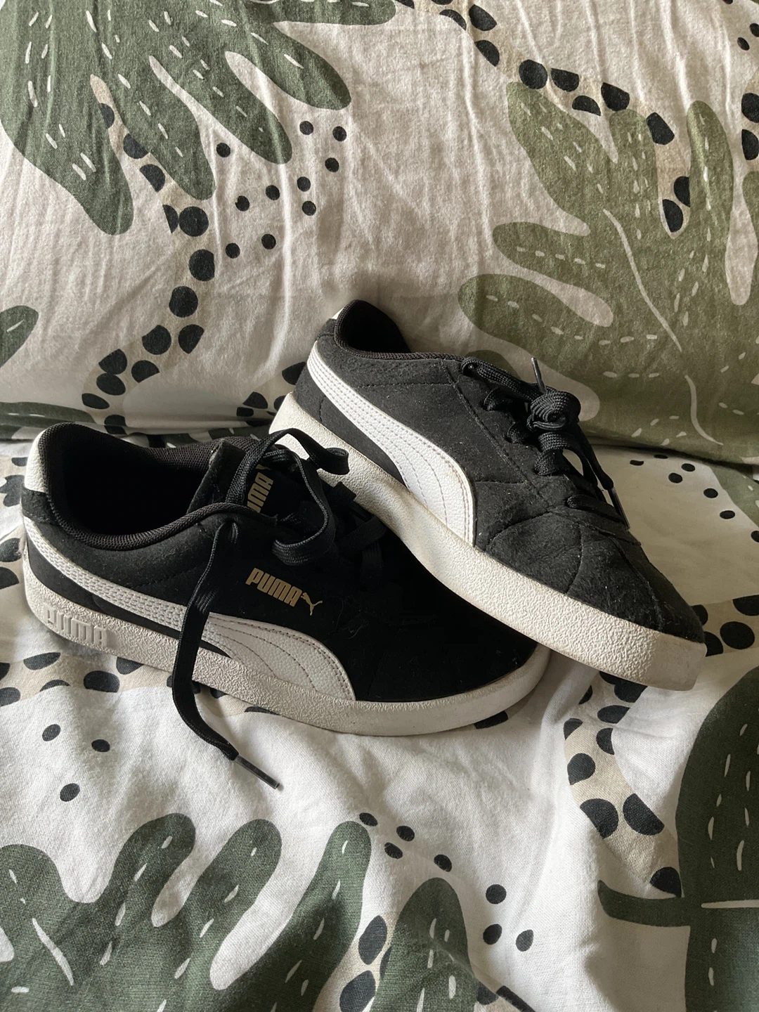 Puma black and white sneakers