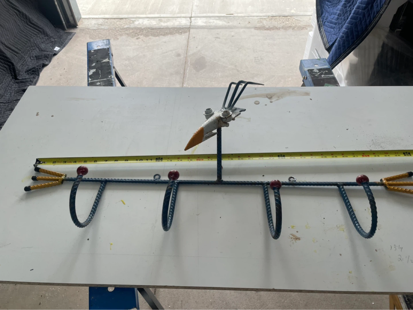 Ornamental yard or garden hook