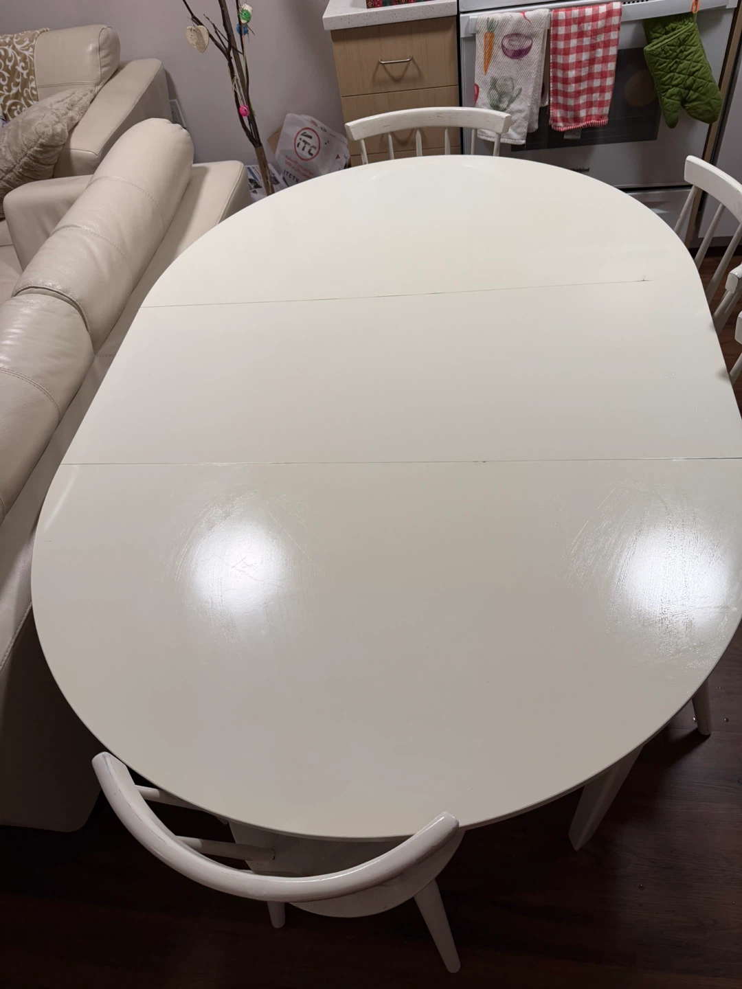 White Oval Extendable Dining Table with 4 Chairs