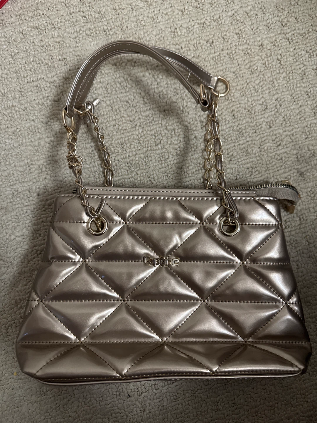 Rose gold handbag with compartments