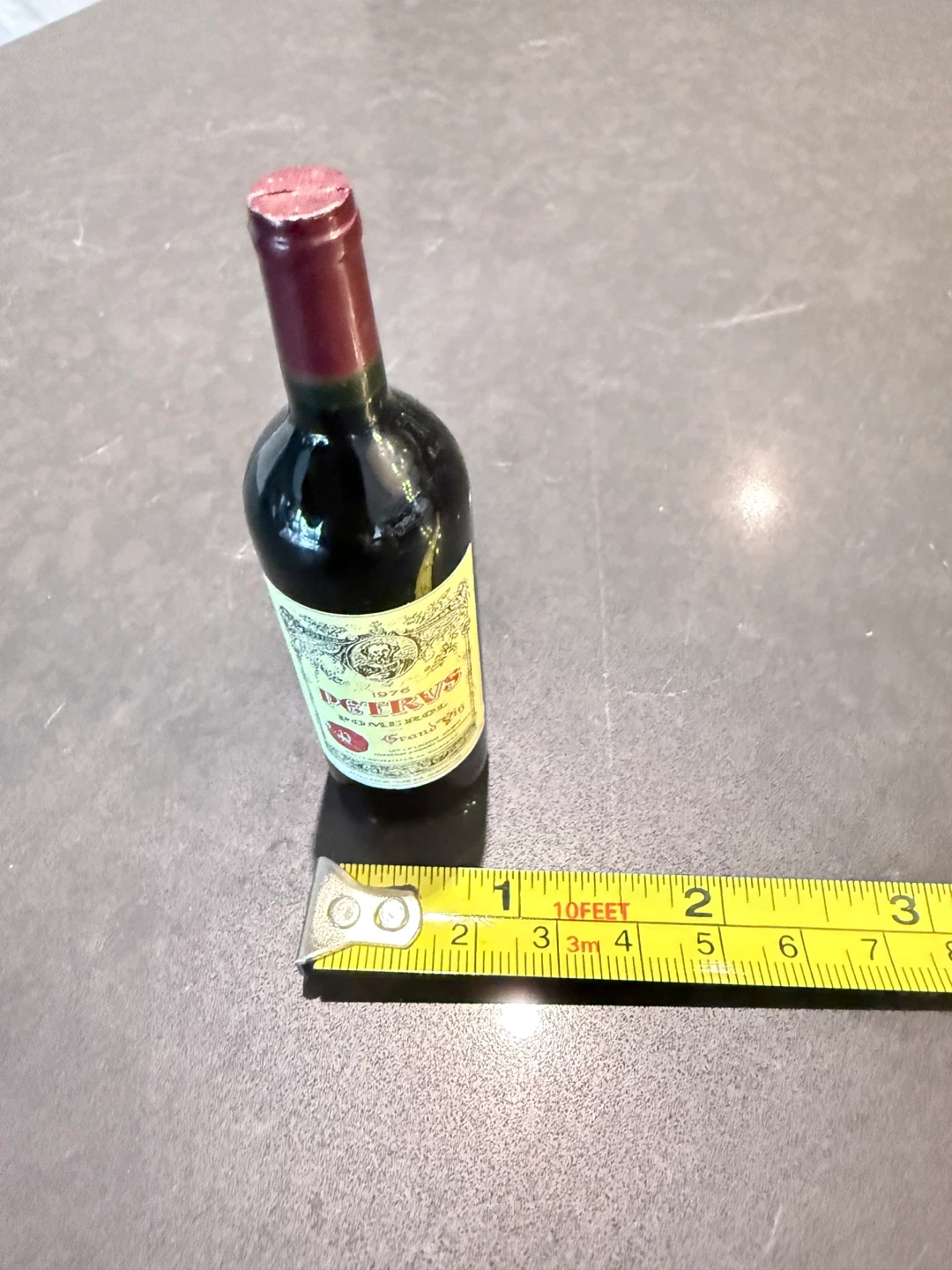 Fridge magnet feature a mini wine bottle. - photo 4