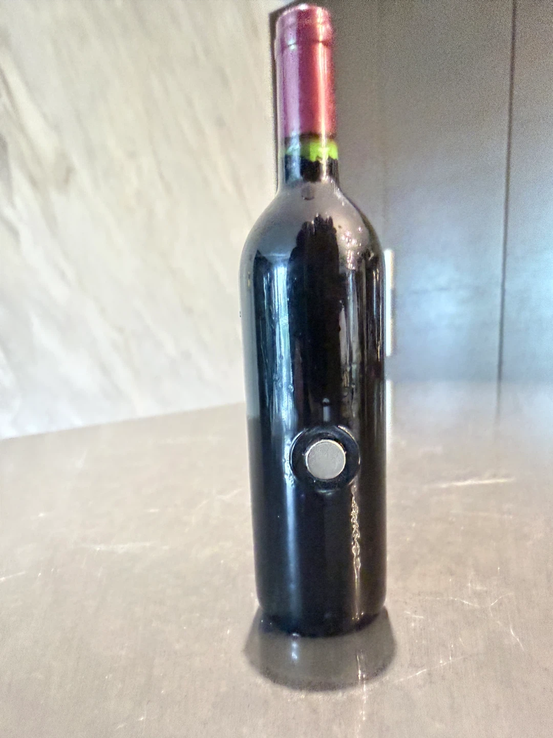 Fridge magnet feature a mini wine bottle. - photo 2