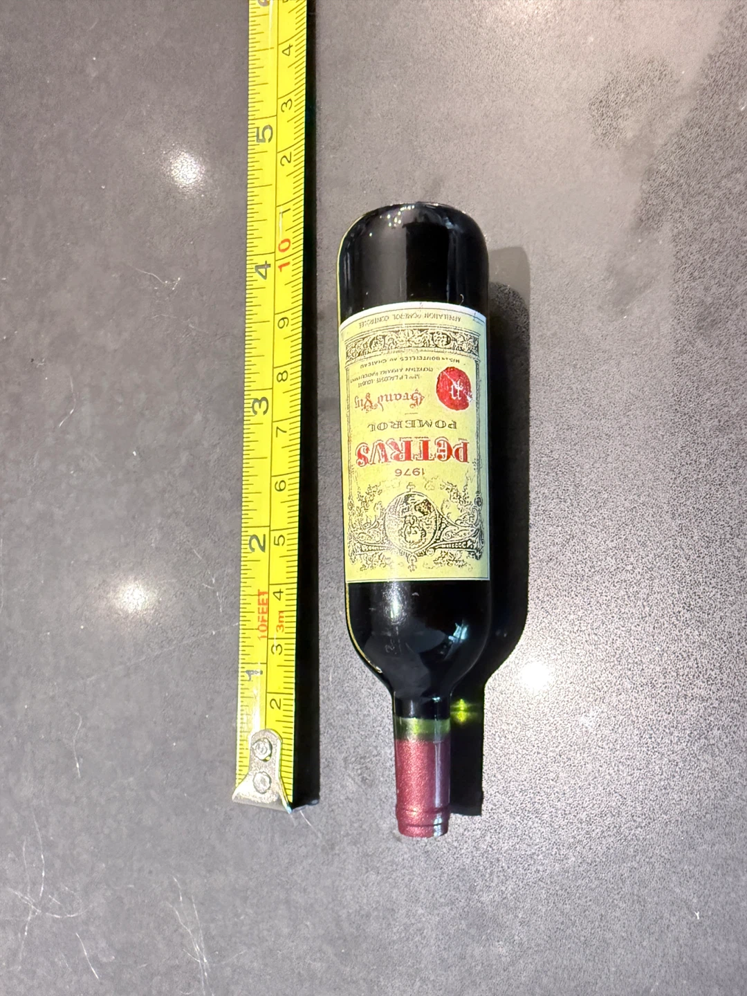 Fridge magnet feature a mini wine bottle. - photo 3