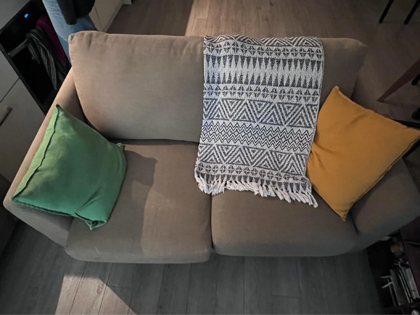 Brown Sofa with a black and white throw - photo 3