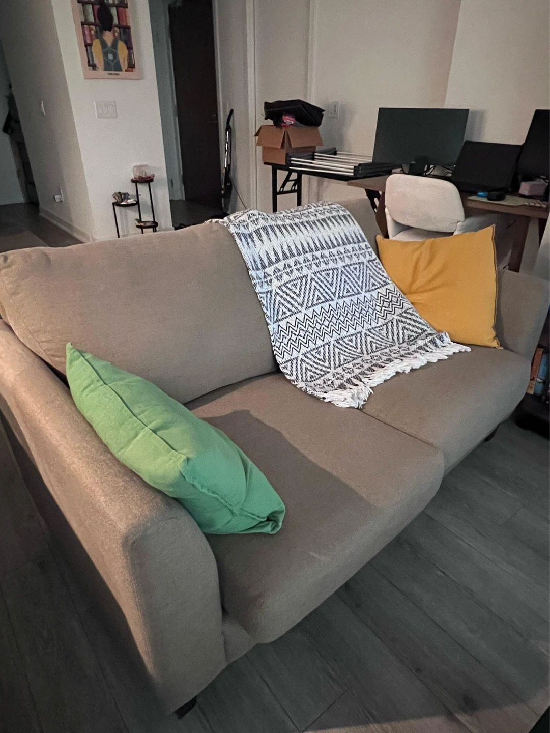 Brown Sofa with a black and white throw - photo 2