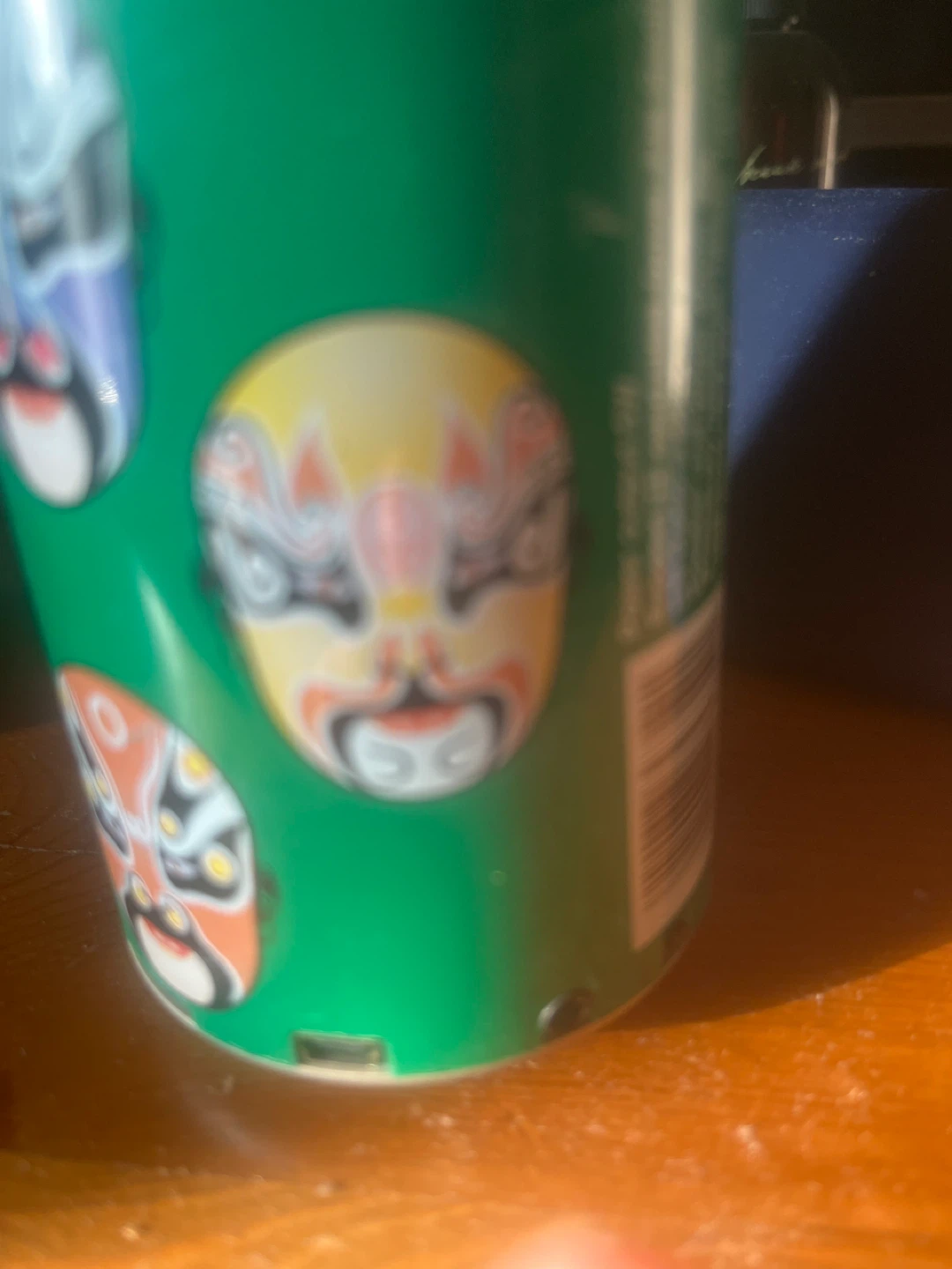 Green Can with Chinese Opera Masks