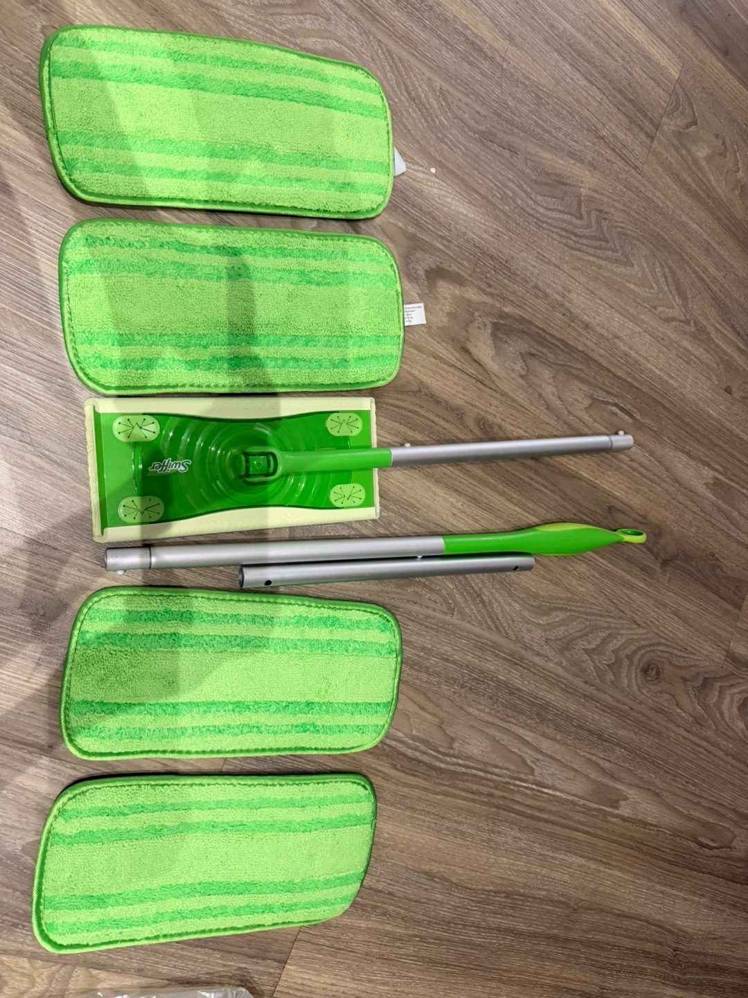 New Swiffer with 4 new Machine washable pads