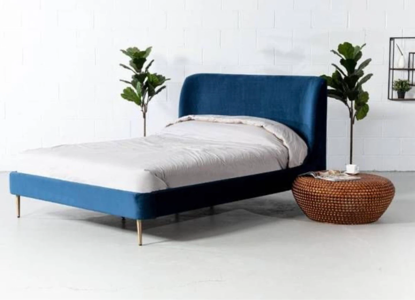 King Meredith bed frame and a chair