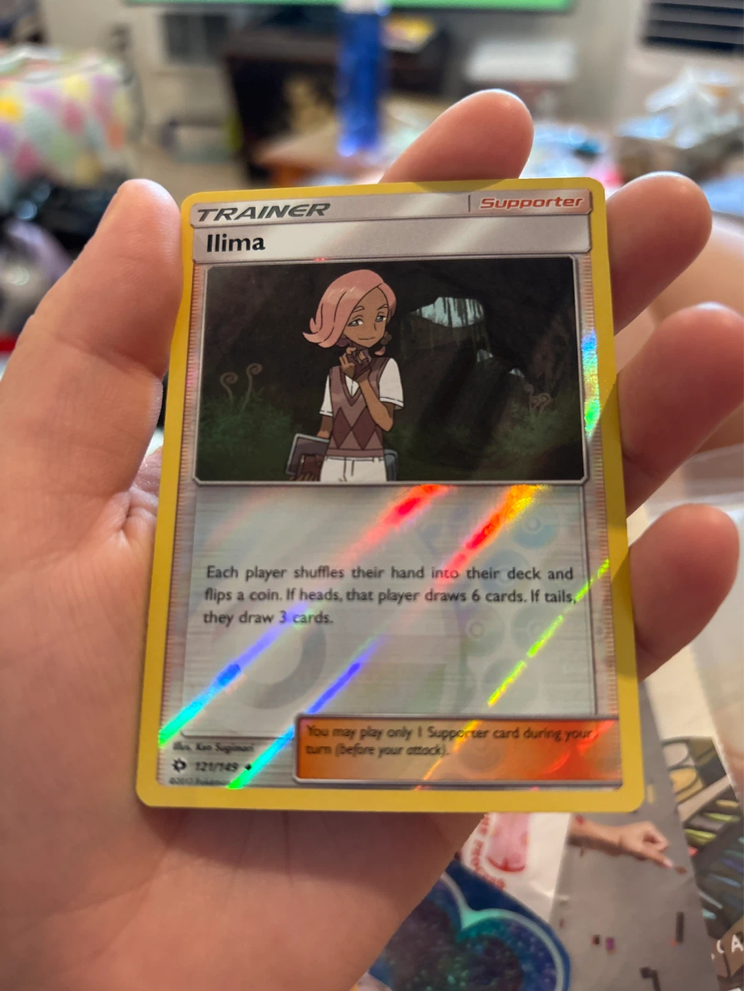Holographic Ilima Trainer Supporter Card