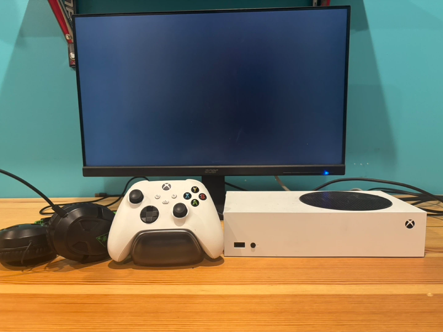 Xbox series S, controller, headset and monitor.