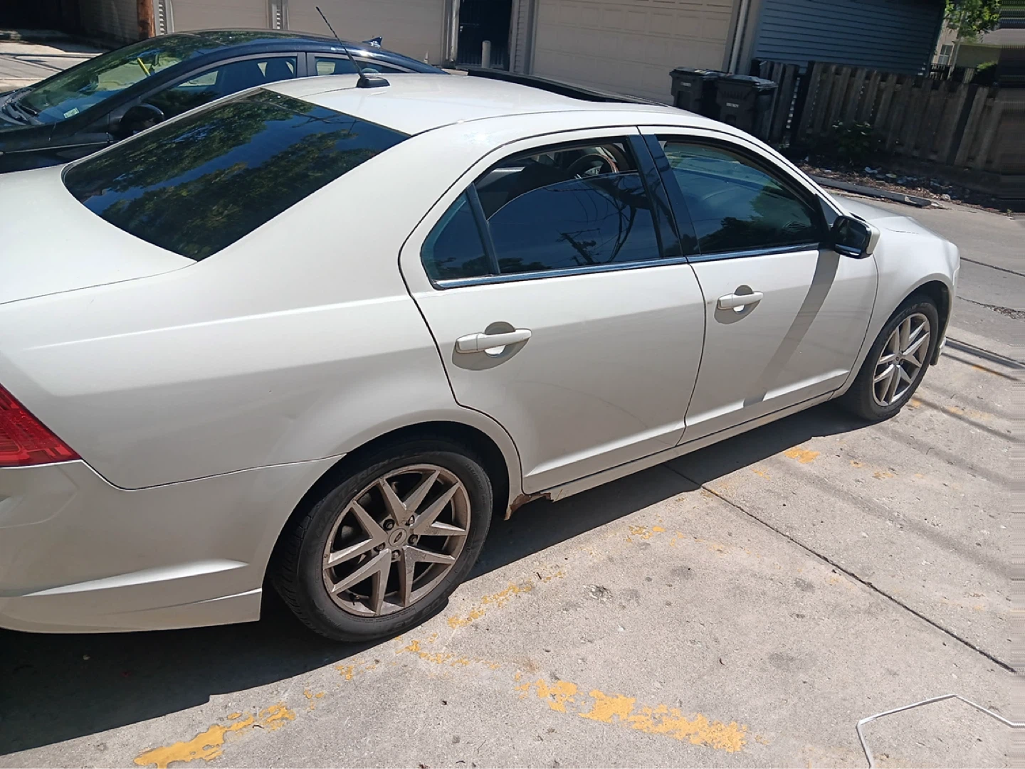 White Ford Sedan