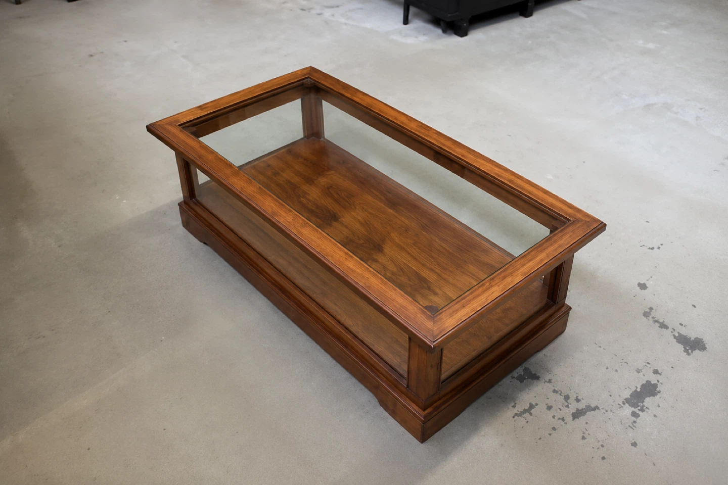 Wooden coffee table with glass top