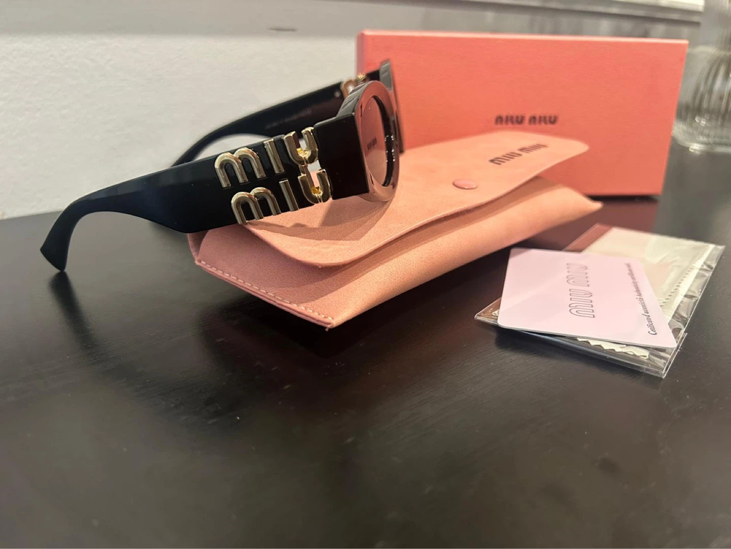 Miu Miu Black Oval Sunglasses - photo 4