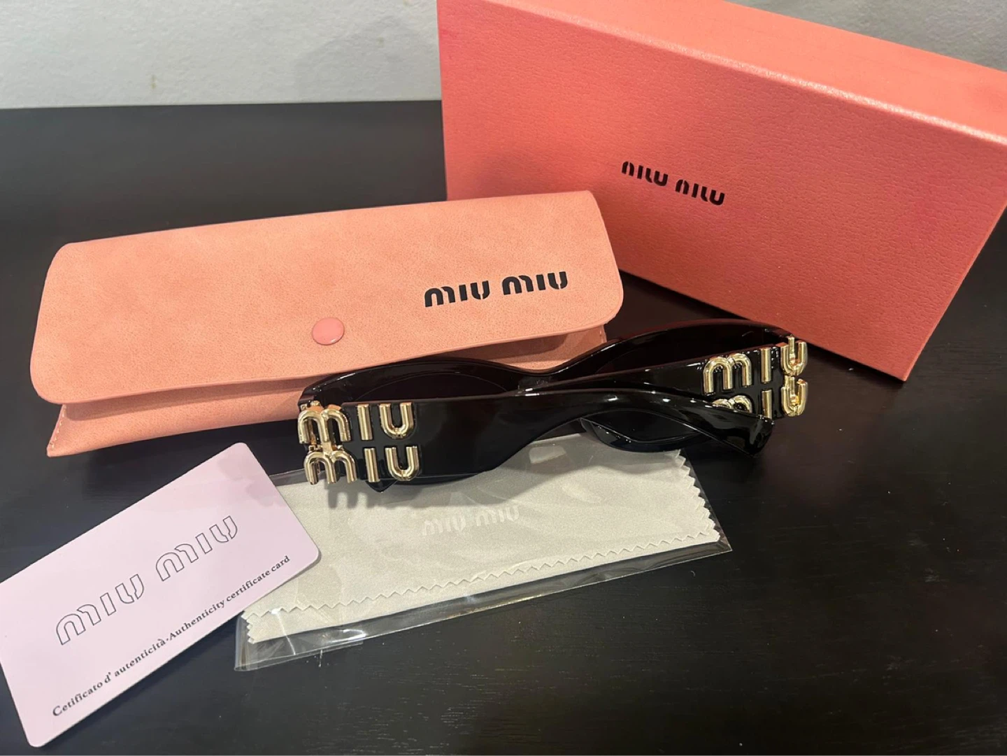 Miu Miu Black Oval Sunglasses - photo 2
