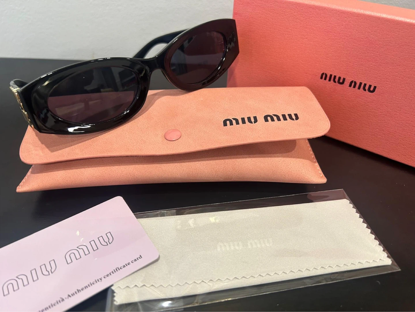Miu Miu Black Oval Sunglasses - photo 3
