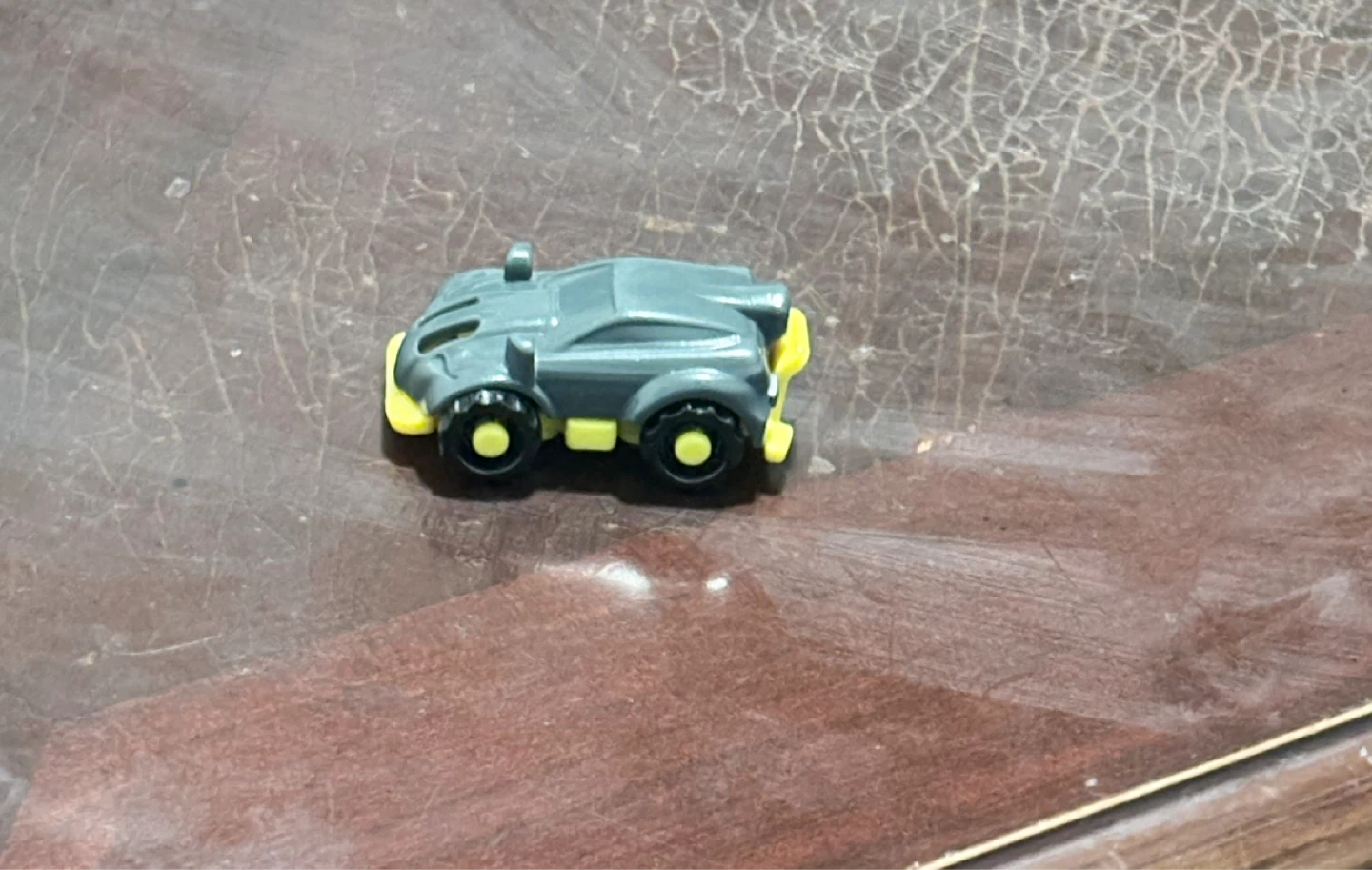 Grey Toy Car with Yellow Accents