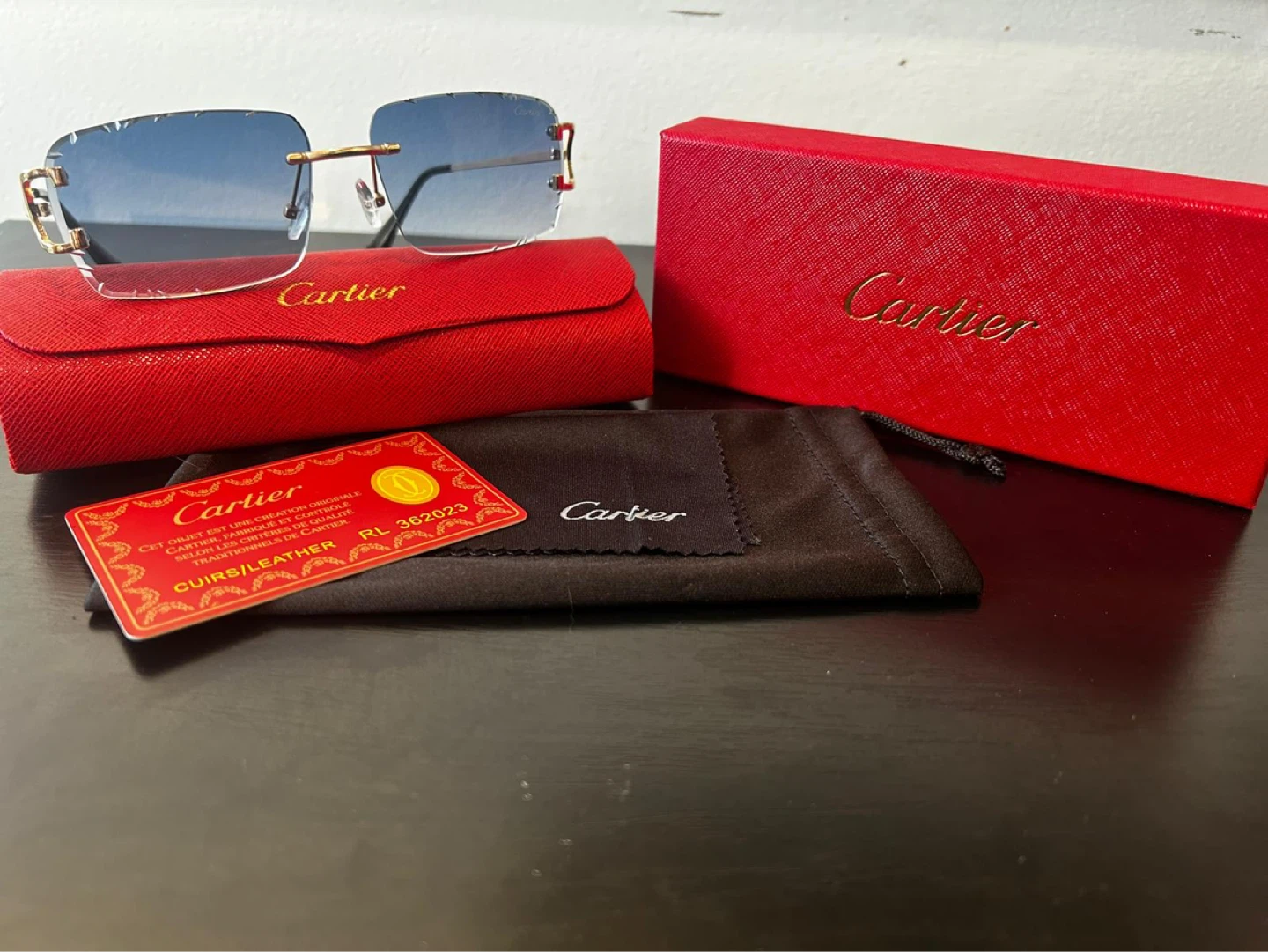 Blue Cartier Rimless Sunglasses with Case and Box