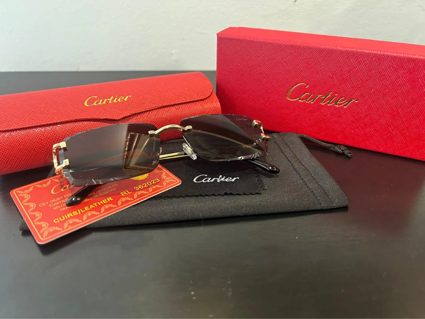 Black Cartier Rimless Sunglasses with Red Case and Box - photo 3