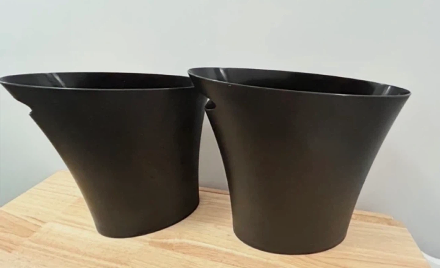 Set of 2 black plastic trash cans
