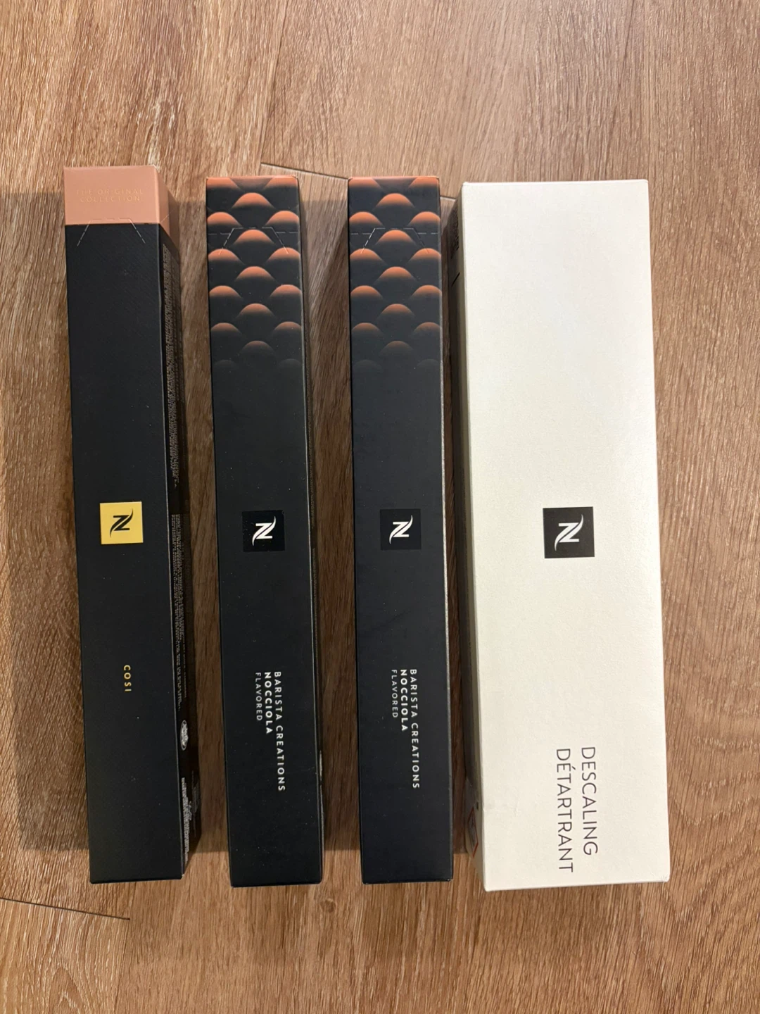3 nespresso capsules + 2 packs of descaling stuff