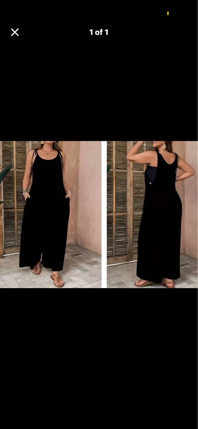 Plus size Black jumpsuit with Tie Straps. Size 1XL